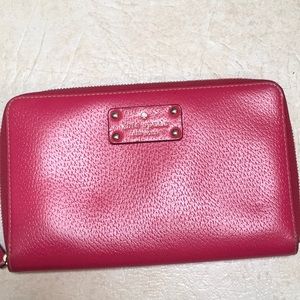 Kate Spade Bifold Wallet. 9” x 5”. Dark pink